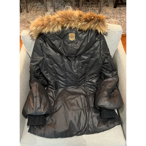 Black Mackage puffer with fur hood.  Fair condition. - Picture 1 of 2
